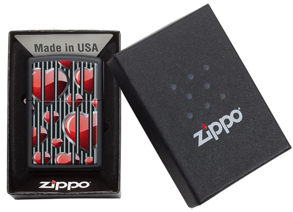 Zippo aansteker zwart harten achter tralies in open doos