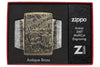 Zippo-aansteker antiek messing met diep gegraveerde doodshoofden in open luxe verpakking