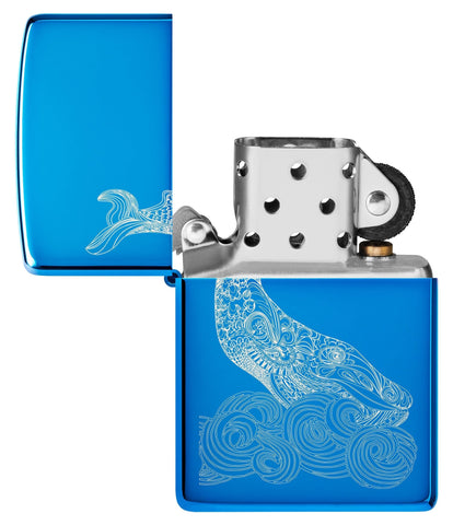 Zippo aansteker walvis ontwerp glanzend lichtblauw met een gegraveerde walvis met ronde golven geopend zonder vlam